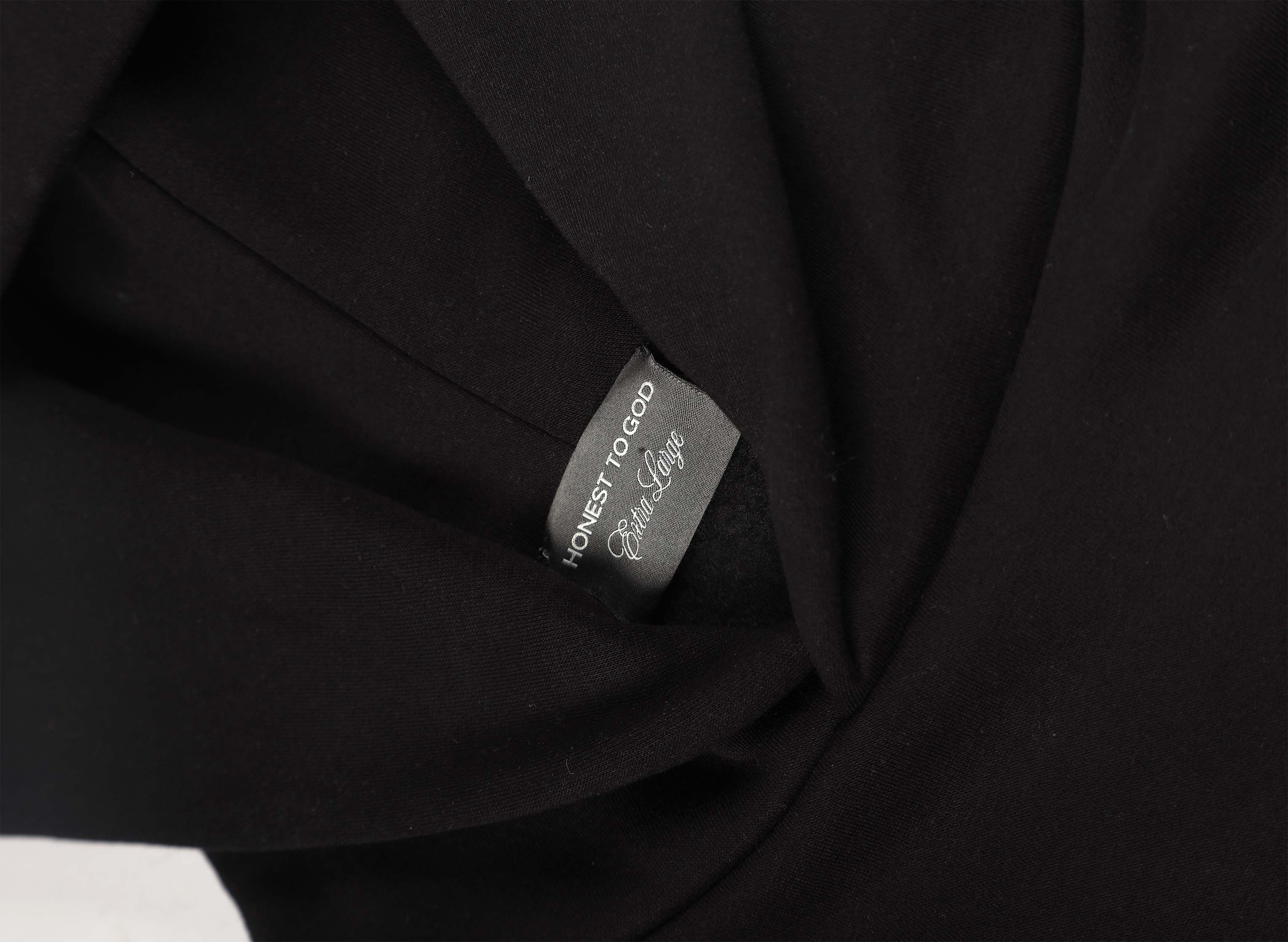 Detail shot of the structured double-layered hood on Honest to God Black hoodie.