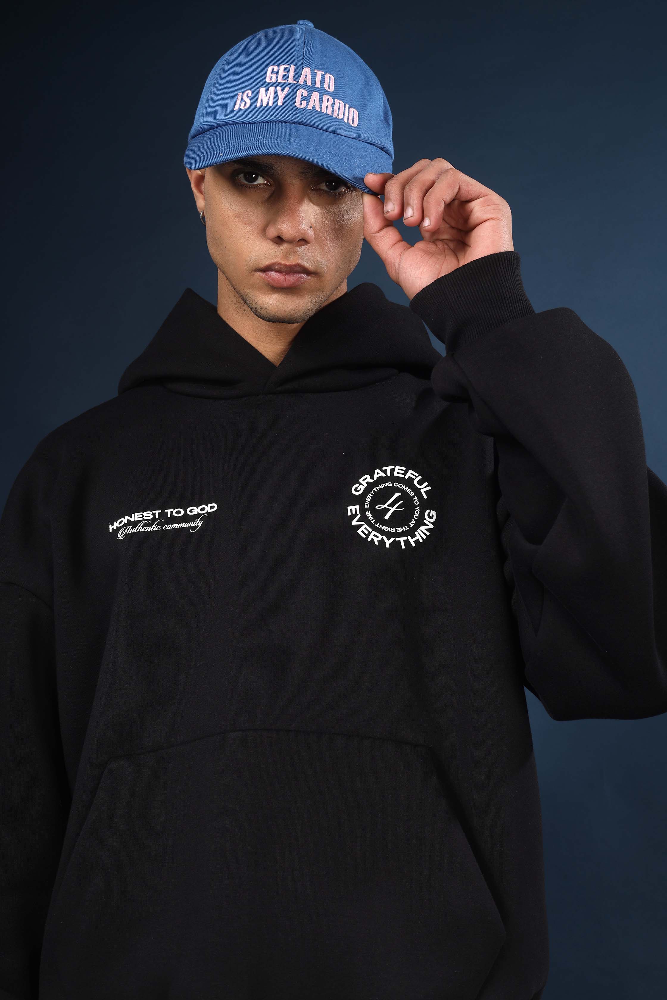 High-density ribbed cuff and hem detail on Honest to God heavyweight black hoodie.